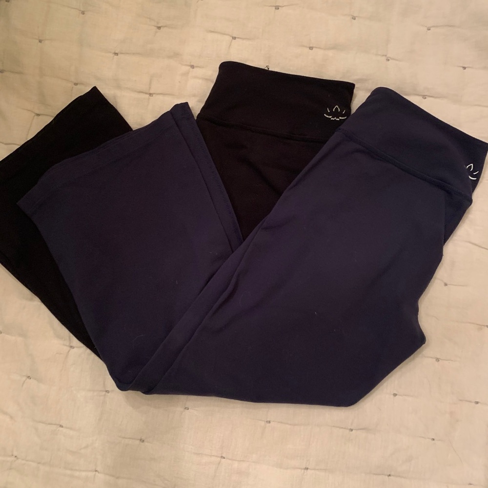 2 pairs of beyond yoga pants. 3/4 length wide leg.